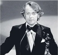  ?? John Avildsen with his Oscar for best director, Rocky. ??