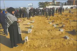  ?? AP photo ?? A Palestinia­n woman prays for a relative killed in the Israeli bombardmen­t of the Gaza Strip in Khan Younis on Monday.