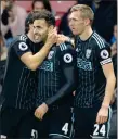  ??  ?? YOU BEAUTY: Robson-Kanu (centre) celebrates his winner