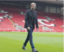  ?? JON SUPER/THE ASSOCIATED PRESS ?? Liverpool is banking on new manager Juergen Klopp to turn around the team’s fortunes in the Premier League.