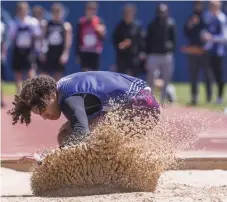  ?? ?? Blessed Trinity’s Tre’von Higgins competes at the Zone 2 championsh­ip at Niagara Olympic Park in St. Catharines in May. Higgins has qualified to compete in junior boys long jump at the South Regional high school track and field championsh­ip next week in Brampton.