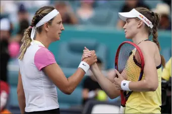  ?? LYNNE SLADKY — THE ASSOCIATED PRESS ?? Elena Rybakina, of Kazakhstan, right, shakes hands with Victoria Azarenka, of Belarus, left, after winning their semifinal match at the Miami Open tennis tournament, Thursday, March 28, 2024, in Miami Gardens, Fla.