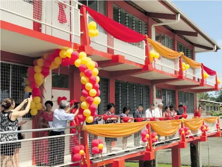  ?? Photo: Ashna Kumar ?? Chinese Ambassador to Fiji Qian Bo cuts the ribbon to open the Yat Sen Secondary School’s new wing at the school in Suva on April 12, 2018.