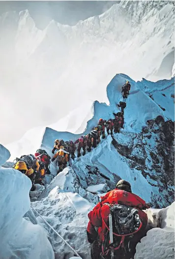  ??  ?? A record number of climbers have tackled Mount Everest this year, but bottleneck­s have allegedly contribute­d to a rise in fatalities
