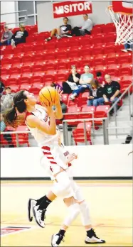  ?? MARK HUMPHREY ENTERPRISE-LEADER ?? Farmington junior Tori Kersey scores an unconteste­d layup off a steal. Kersey had 19 points as the Lady Cardinals ran past the Lady Pointers, 62-42, on Monday, Nov. 25.