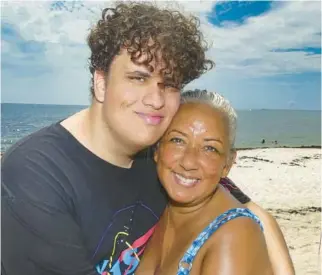  ?? ?? Idelma Quintana and her son Ian, 19, have been through mindfulnes­s training. She has seen the positive changes that have happened for him. They are shown at Dania Beach during a Juneteenth mindfulnes­s event.