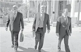  ?? AMY BETH BENNETT/SUN SENTINEL ?? Attorneys for mail bomb suspect Cesar Sayoc, 56, from left; Jamie Benjamin, Daniel Aaronson and Peter Patanzo, leave the James Lawrence King Federal Justice Building in Miami.