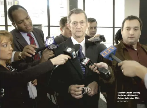  ?? AP FILE PHOTO ?? Stephen Coburn (center), the father of Edward A. Coburn, in October 2001.