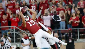  ??  ?? In this Aug. 31 file photo, Stanford wide receiver JJ Arcega-Whiteside (19) catches a touchdown pass against San Diego State cornerback Ron Smith (17) during the first half of an NCAA college football game in Stanford, Calif.AP Photo/tony AVelAr