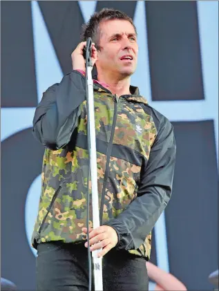  ?? ROB GRABOWSKI/INVISION/AP ?? Liam Gallagher performs on day one at Lollapaloo­za in Grant Park on Thursday, Aug 3, 2017 in Chicago.