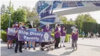  ?? ?? A scene from “The American Dream and Other Fairy Tales” shows Disney cast members fighting for a fair wage in 2021.