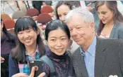  ?? SCOTT OLSON/GETTY ?? The University of Chicago’s Richard Thaler draws a crowd after Monday’s announceme­nt.