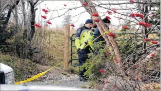  ?? KEITH GOSSE/THE TELEGRAM ?? Police are shown on O’brien’s Farm Road in St. John’s Saturday just after midday.