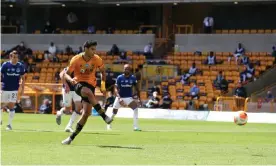  ??  ?? Raúl Jiménez opens the scoring from the penalty spot and Wolves didn’t look back to claim a much-needed victory over Everton. Photograph: Bradley Ormesher/Bradley Ormesher NMCPool