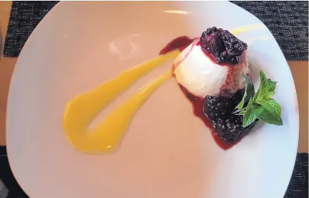  ?? KAREN PETERSON/FOR THE JOURNAL ?? Yuzu panna cotta with blackberry compote is the ideal finale to a summer meal.
