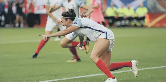  ??  ?? Jodie Taylor celebrates her second goal against Scotland