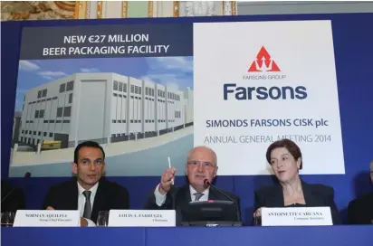  ??  ?? Farsons Group Chairman Louis A Farrugia flanked by Group CEO Norman Aquilina and company secretary Antoinette Caruana