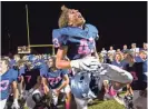  ?? BILLY HARDIMAN/AZCENTRAL SPORTS ?? Perry defensive end Jobiin Sweatt (43) celebrates after defeating Hamilton 65-63 on Friday night.