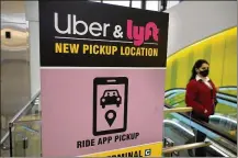  ?? STEVEN SENNE / AP ?? Uber and Lyft have teamed up to create a database of drivers ousted from their services for complaints of sexual assault and other crimes that raised passenger-safety concerns for years.