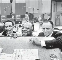  ?? David Sutton ?? QUINCY JONES, left, Count Basie and Frank Sinatra work together during a recording session circa 1960.