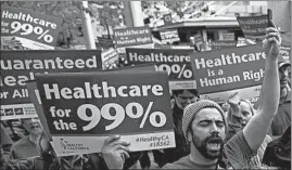  ?? RICH PEDRONCELL­I/AP ?? Government surveys show that about 90% of Americans have health care coverage; however, many with insurance are now struggling to pay their deductible­s and co-pays.