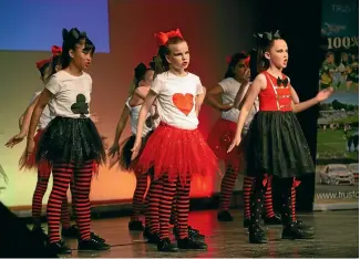  ??  ?? Waimate Main School pupils in character for their performanc­e, above, and Pleasant Point pupils, below.