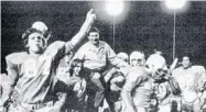  ?? HOLLYWOOD HILLS HIGH/COURTESY ?? Hollywood Hills High School’s Kirk Patrick (87) celebrates with Spartans teammates after winning the Class 4A state championsh­ip game against Jacksonvil­le Raines 22-9 on Dec. 14, 1973 at Lockhart Stadium. In the background is coach Dick Saltrick.
