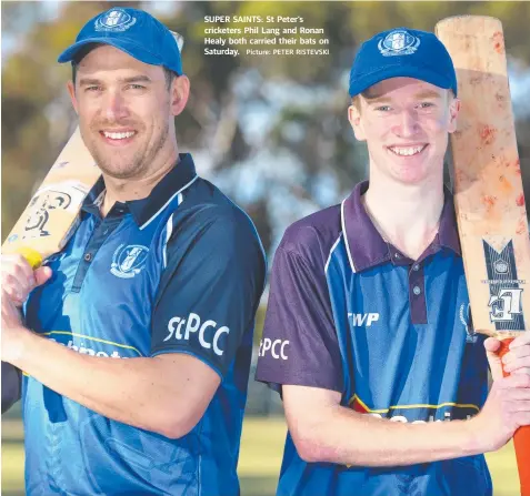  ?? Picture: PETER RISTEVSKI ?? SUPER SAINTS: St Peter's cricketers Phil Lang and Ronan Healy both carried their bats on Saturday.