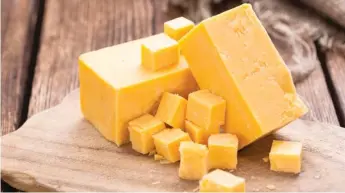  ?? STOCK.ADOBE.COM ?? Hard cheeses like cheddar can stay fresh in the fridge for up to six months if their packaging is unopened. In the freezer, that same unopened package also can last six months.