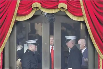  ?? Patrick Semansky Associated Press ?? ON JAN. 20, 2017, President-elect Donald Trump waits to be inaugurate­d at the U.S. Capitol building.