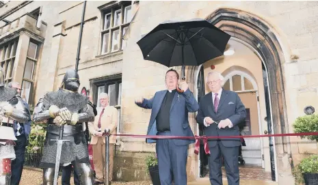  ??  ?? Historian David Starkey cuts the ribbon