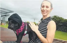  ?? Picture: RICHARD GOSLING ?? Jodie Bartlett with Freyja in her harness.