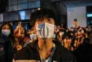  ?? AFP/Getty Images ?? People gather on a street in Shanghai last November to protest against China’s zeroCovid policy. Photograph: Héctor Retamal/