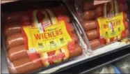  ?? AP PHOTO/CANDICE CHOI ?? Oscar Mayer classic uncured wieners are for sale at a grocery store in New York. Oscar Mayer is touting its new hot dog recipe that uses nitrite derived from celery juice instead of artificial sodium nitrite.