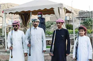  ??  ?? Picture shows Saudi folklore dancers performing the art of “Taasheer”.