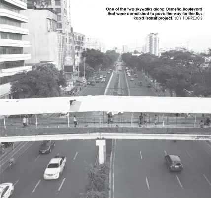  ?? JOY TORREJOS ?? One of the two skywalks along Osmeña Boulevard that were demolished to pave the way for the Bus Rapid Transit project.