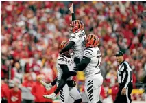  ?? AP ?? Bengals kicker Evan McPherson celebrates booting them into the Super Bowl.
