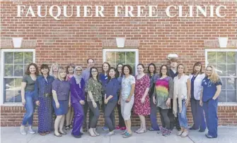  ?? COURTESY PHOTO ?? The staff of the Fauquier Free Clinic in Warrenton, which also serves Rappahanno­ck County.
