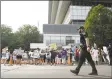  ?? Associated Press ?? Protesters demonstrat­e outside the Purdue headquarte­rs in downtown Stamford in August.