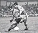  ??  ?? Foes to friends: Dublin’s Tony Hanahoe and Kerry’s Tim Kennelly during the 1975 All Ireland final
