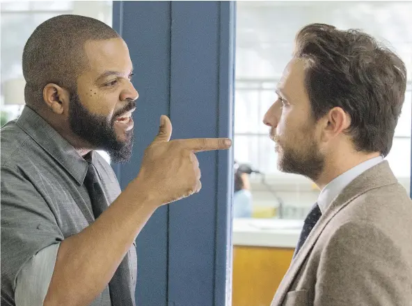  ?? — WARNER BROS. ?? Ice Cube, left, and Charlie Day star in Fist Fight, a film filled with jokes teenagers might appreciate.