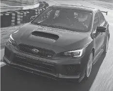  ??  ?? The 2018 Subaru WRX STI Type RA. SUBARU