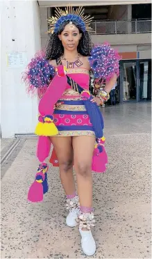  ?? CHARMAINE MAZIBUKO ?? COLOURFULL­Y decked out Noxolo Nqobile Ndlovu attended the event at Moses Mabhida Stadium yesterday. |