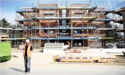  ?? Photograph: Hannah Peters/Getty Images ?? Economists have estimated new Zealand is short of about half a million low-cost houses.