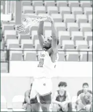  ?? Courtesy Photo/ Tony Claxton ?? Bonny Udoh slames home the ball in a dominate victory 112-64.