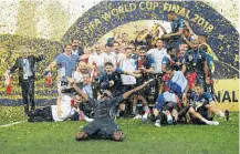  ?? Picture: MATTHIAS HANGST/GETTY IMAGES ?? JOY BEHOLD: Paul Pogba of France celebrates as his teammates lift the World Cup trophy after their victory in the final against Croatia in Moscow.