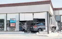  ?? BRYON JOHNSON/METROLAND ?? A man is in hospital after an SUV crashed into a Mississaug­a store on Tuesday.