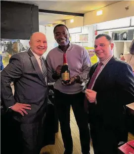  ?? Tony's at the JHOUSE / Contribute­d photo ?? NBA All-star Isiah Thomas, center, celebratin­g Greenwich Restaurant Week at Tony's at the JHouse with Cheurlin Champagne, one of Thomas' latest ventures.