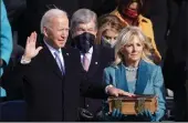  ?? ALEX WONG/GETTY IMAGES ?? Joe Biden is sworn in as President of the United States.