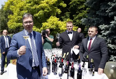  ?? ?? Serbia's outgoing Prime Minister Aleksandar Vucic, left, in 2017 after his last press conference before taking office on Wednesday as president in Belgrade. Darko Vojinovic/Copyright 2017 The Associated Press. All rights reserved.